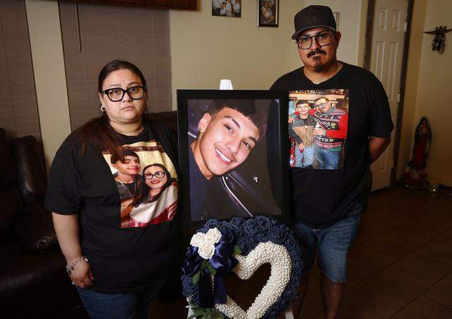 Irma and Jesus Manuel Gonzalez stand beside a framed photo of their seventeen-year-old son Jesus on Monday, March 9, 2026, at their Fort Worth home. Gonzalez was killed in a suspected drunk-driving crash in January. He was a passenger in a car driven by his friend Israel Suastegui.
